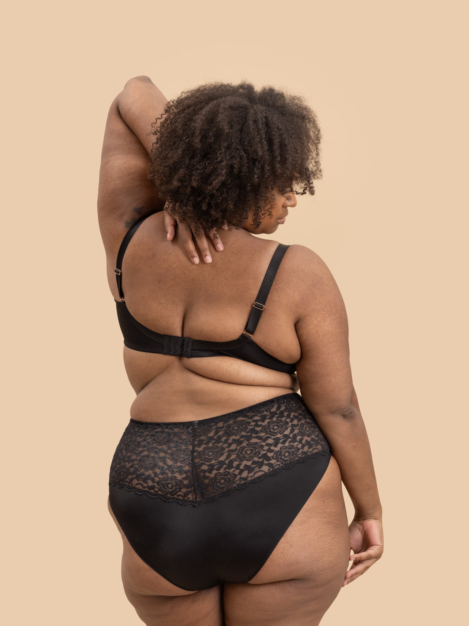 Back view of PKI-U VERSE black lace high-waist panties and support bra