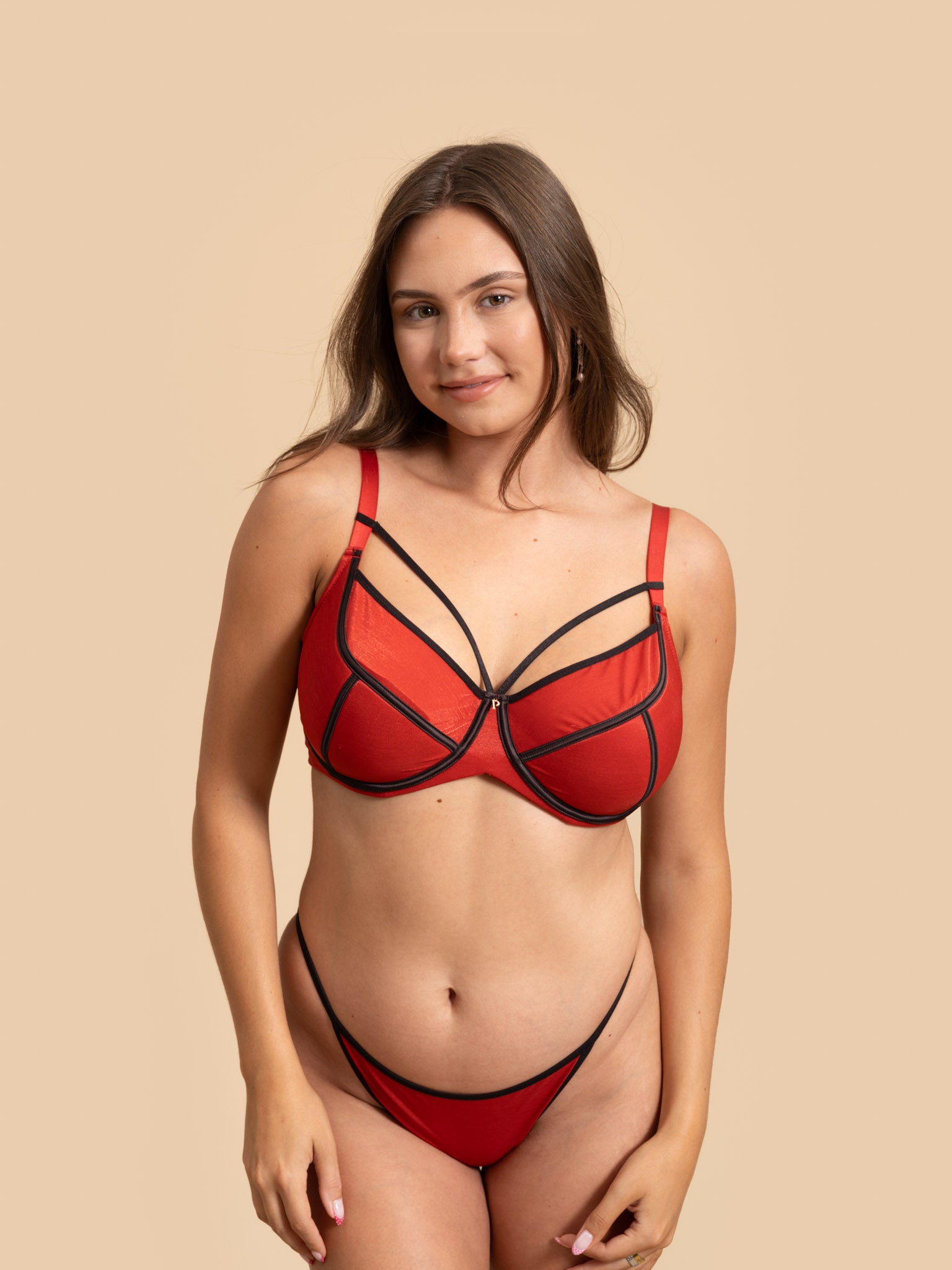 Front view of the GLOW Duo-Tone Radiance Lingerie set in vibrant Red with Black trim.