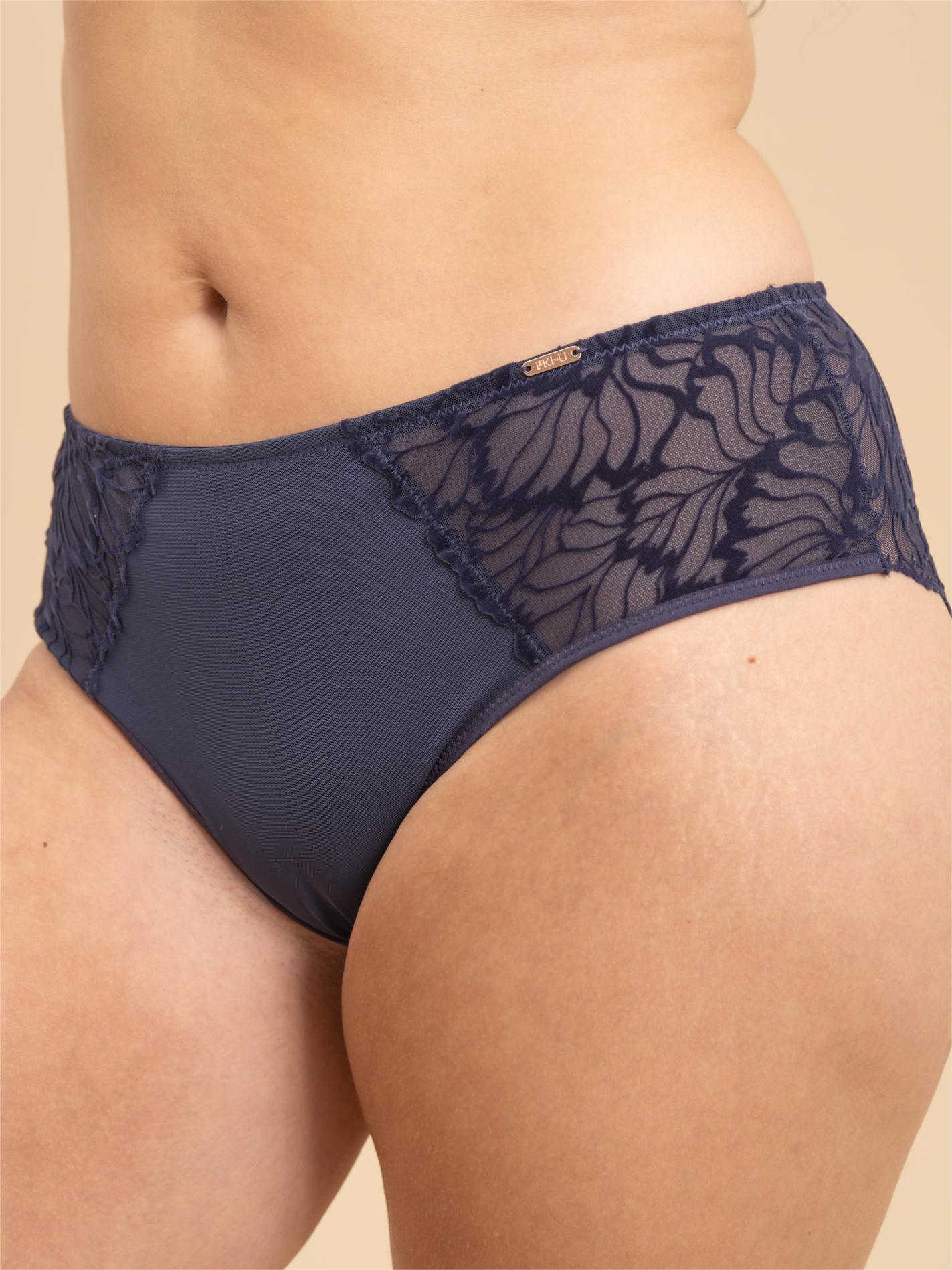 Side view of Navy Blue high-waisted briefs with flocked lace side detailing.
