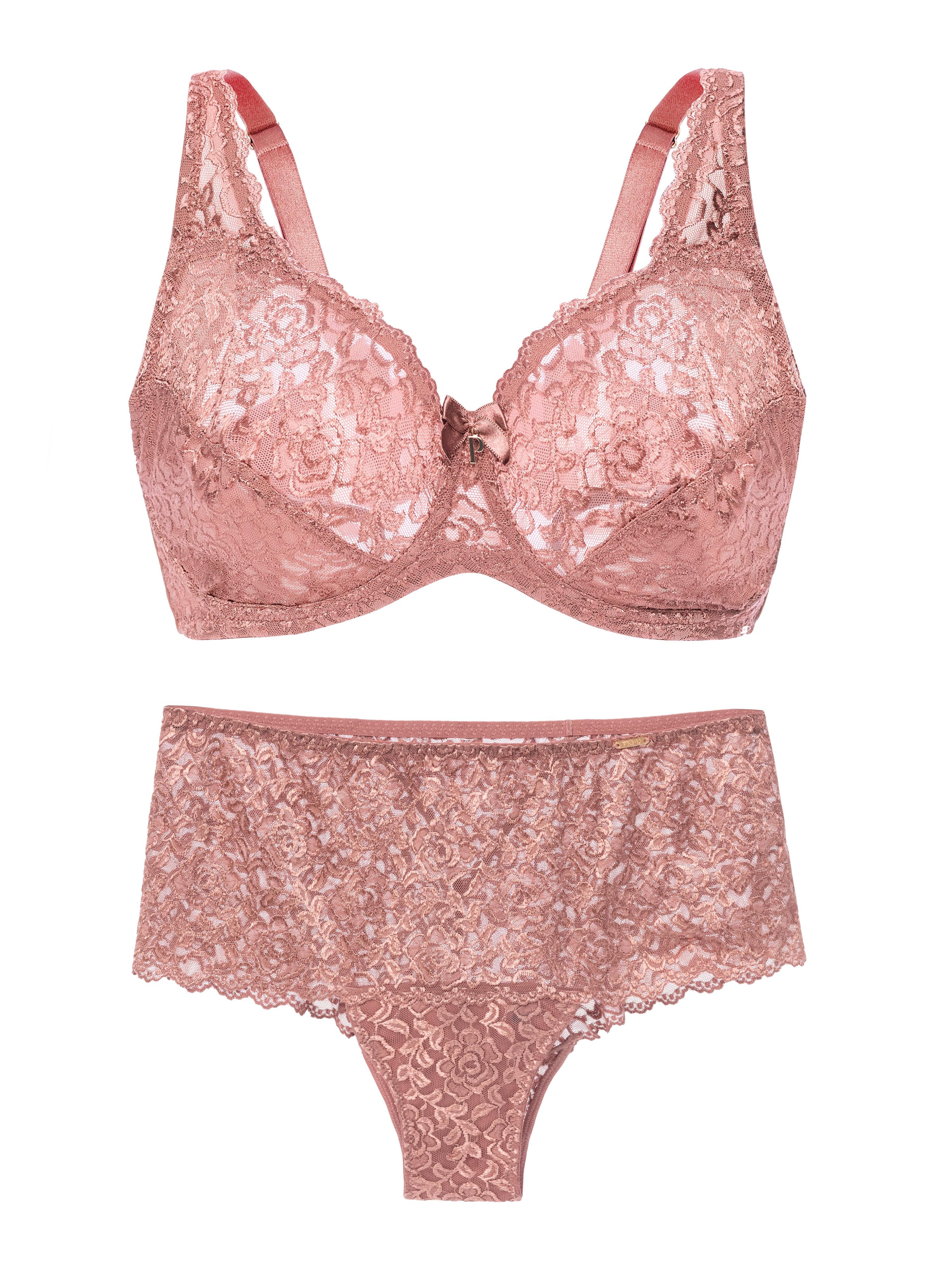 Pink lace bra and panties set on a white background