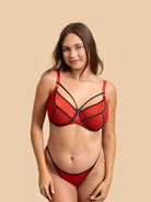 Front view of the GLOW Duo-Tone Radiance Lingerie set in vibrant Red with Black trim.