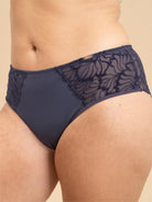 Side view of Navy Blue high-waisted briefs with flocked lace side detailing.