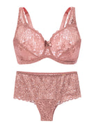 Pink lace bra and panties set on a white background